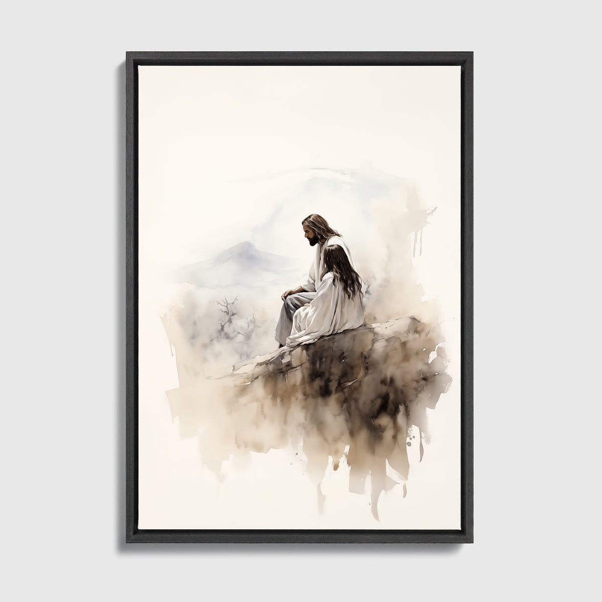 A framed art print featuring a watercolor-style illustration of Jesus Christ sitting on a rocky outcrop, rendered in soft brown, beige, and gray tones on a white background, enclosed in a black frame.